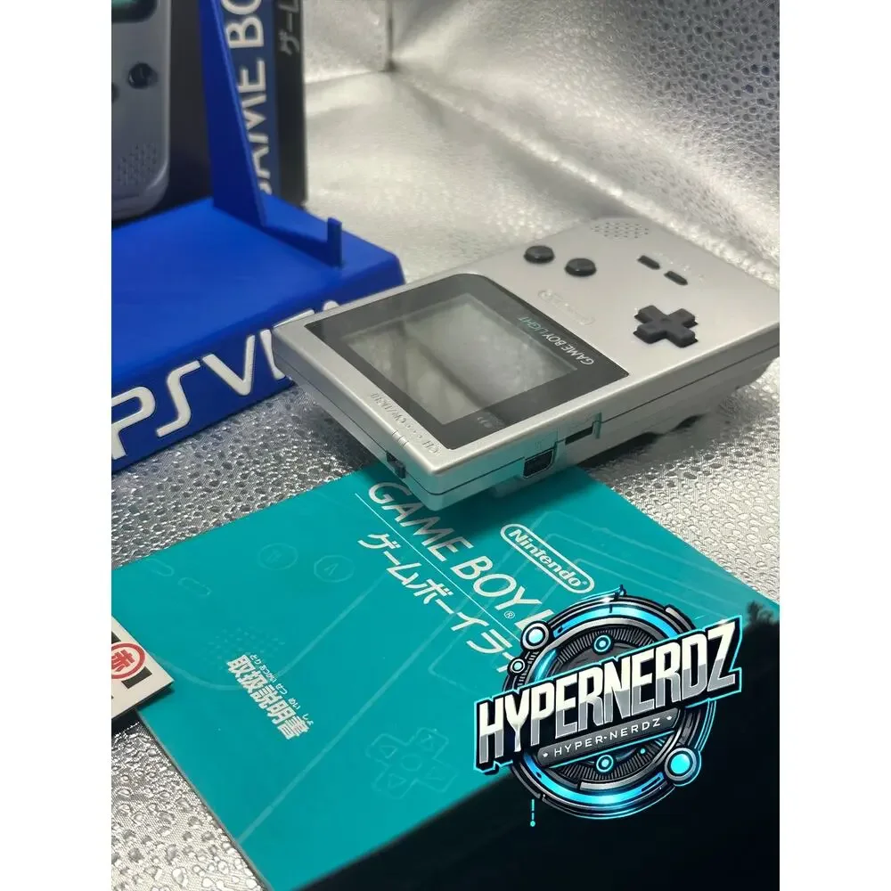 Sliver gameboy light in box! Amazing condition!